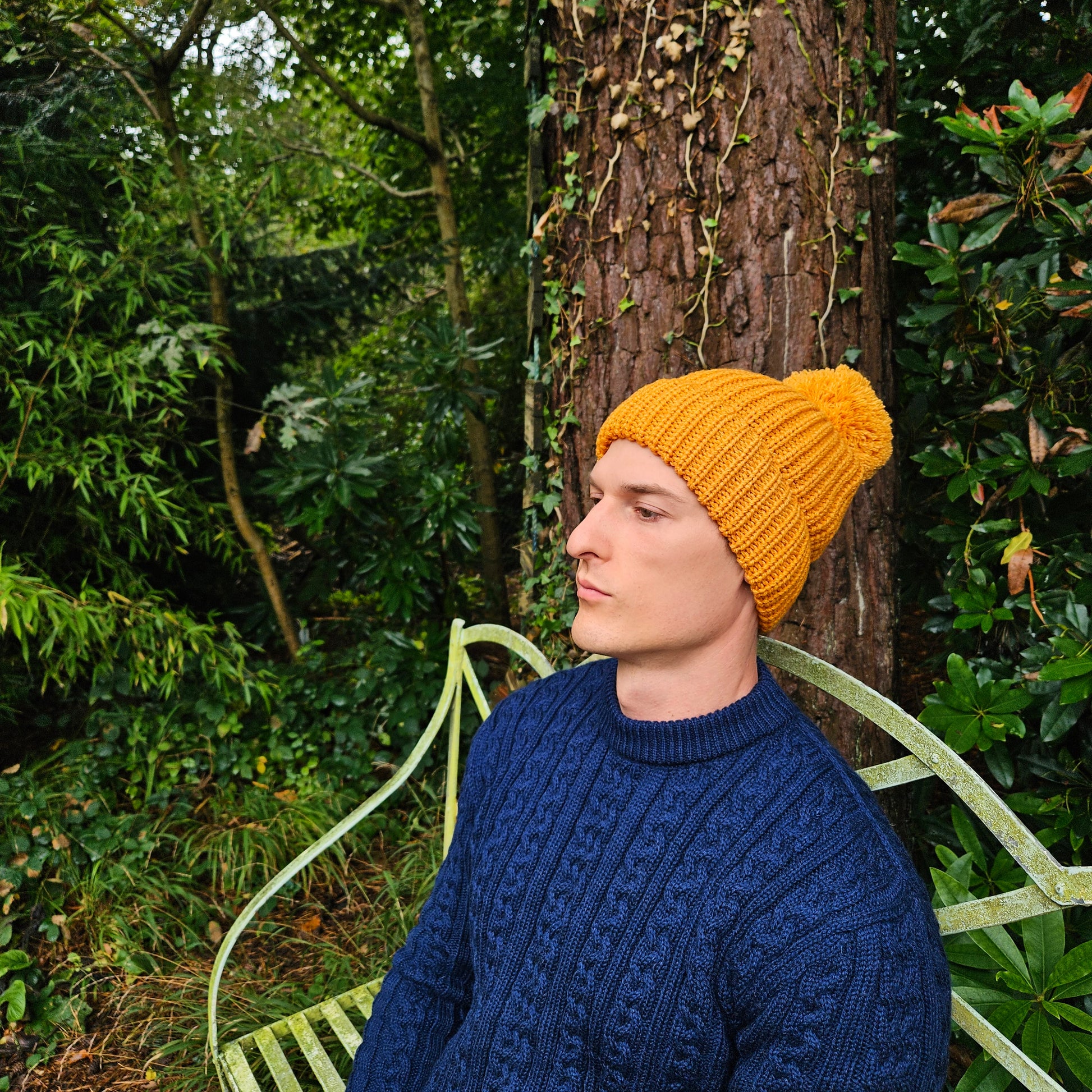 Men's hat with a pom pom