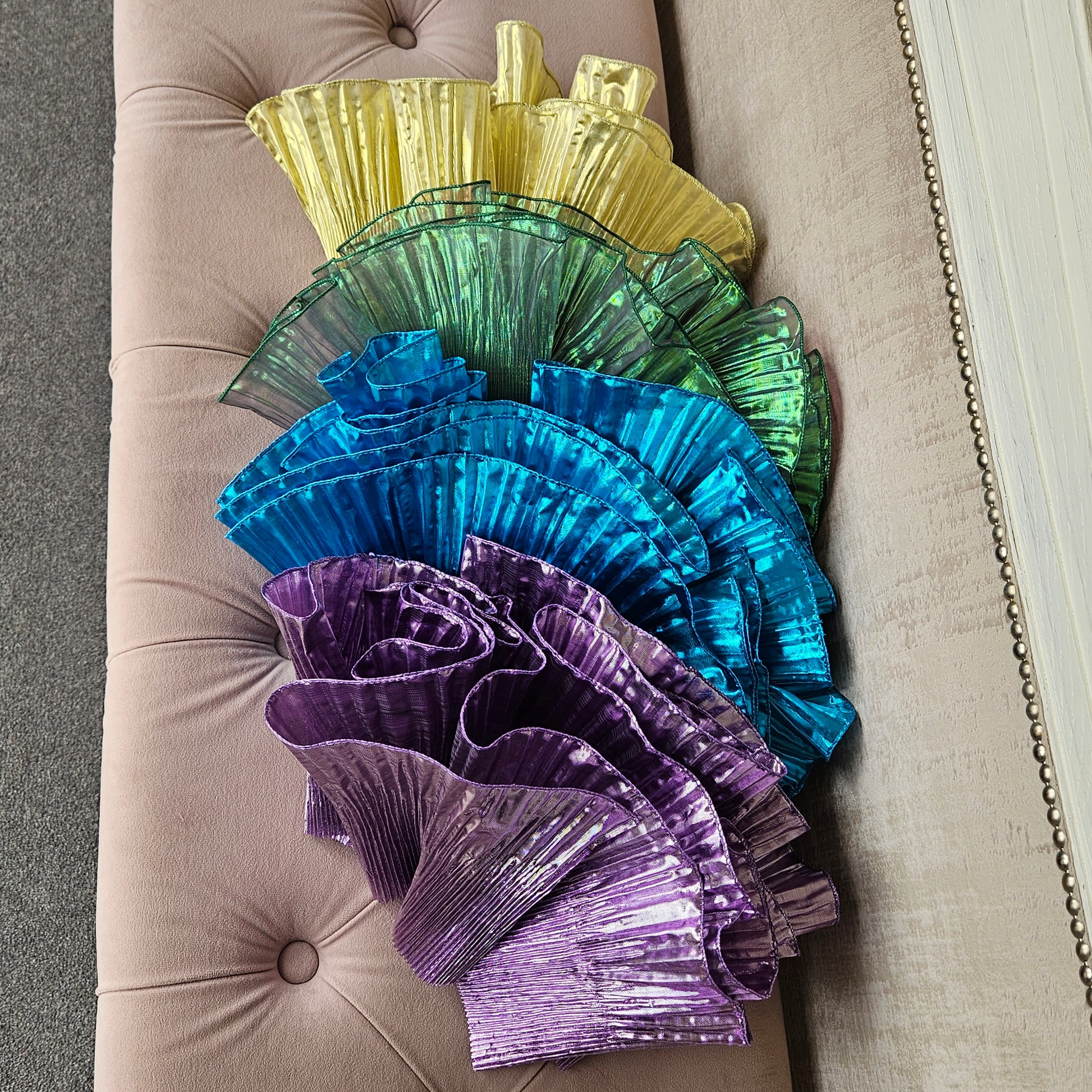 gold, purple, blue, green decor hats for races