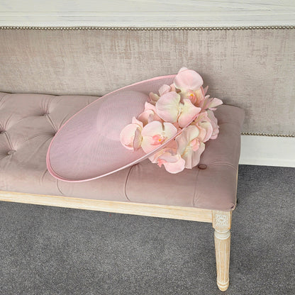 extra large pink hatinator with flowers for a ladies day at royal enclosure at Royal Ascot
