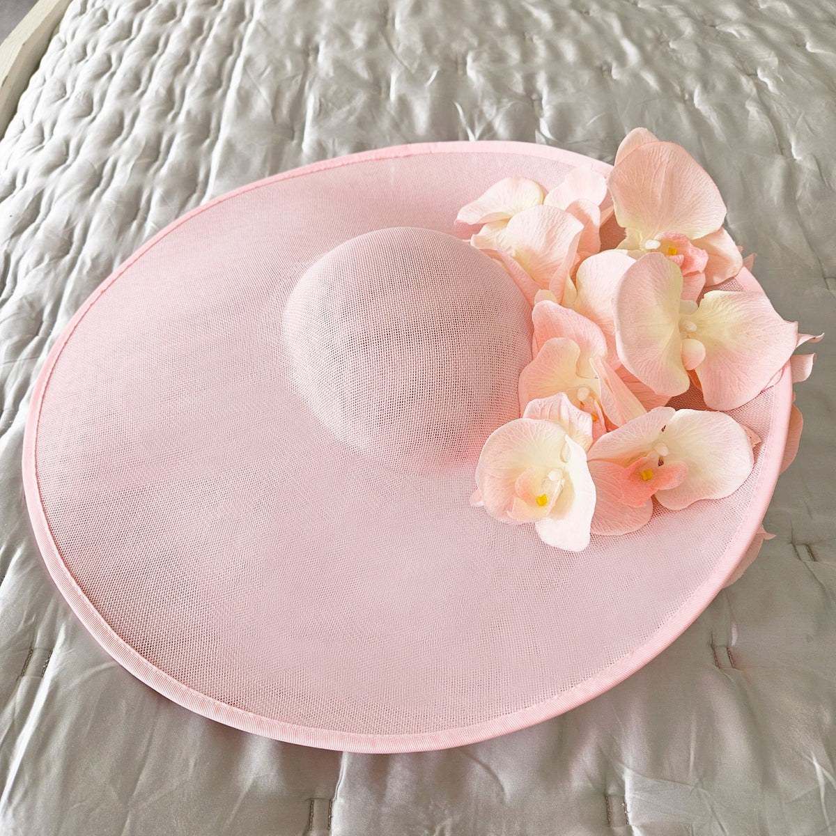 pale pink fascinator hat for royal enclosure at royal ascot