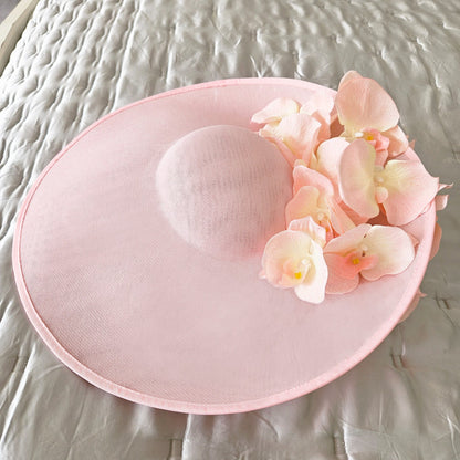 pale pink fascinator hat for royal enclosure at royal ascot